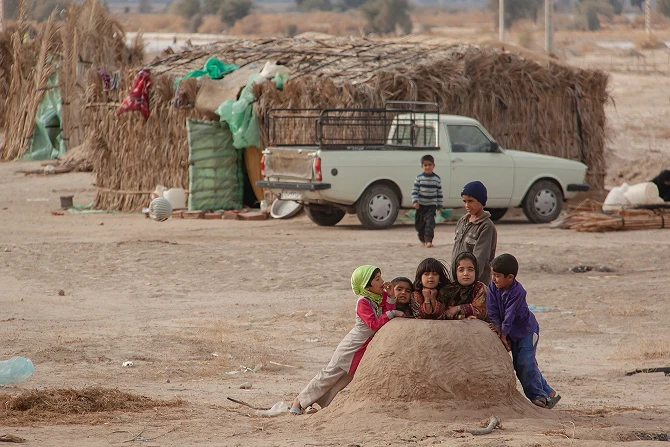Children in post-conflict community benefiting from sustainable development initiatives